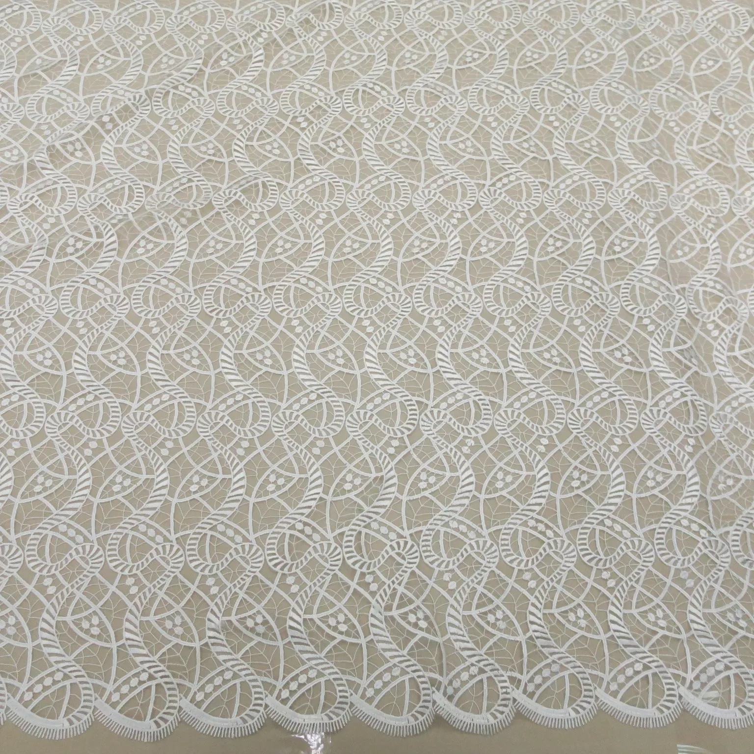 White Corded Spiral Embroidered Double Scalloped Tulle Fabric